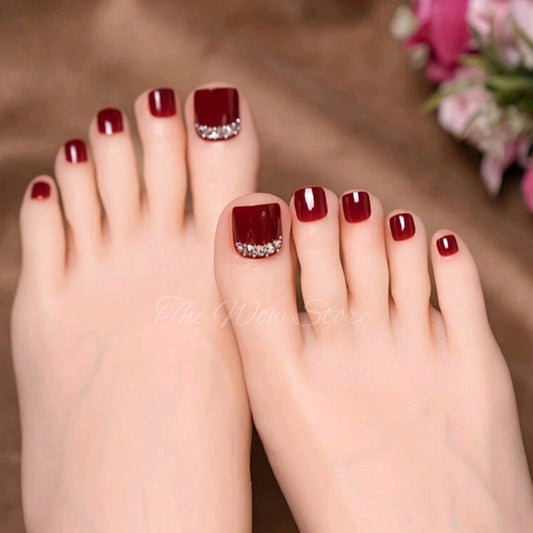 Fancy red toe nails